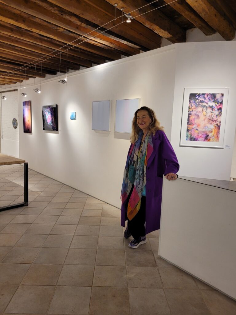 My two paintings are the pale squares on the wall